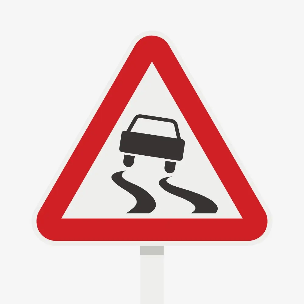 Slippery When Wet Road Sign