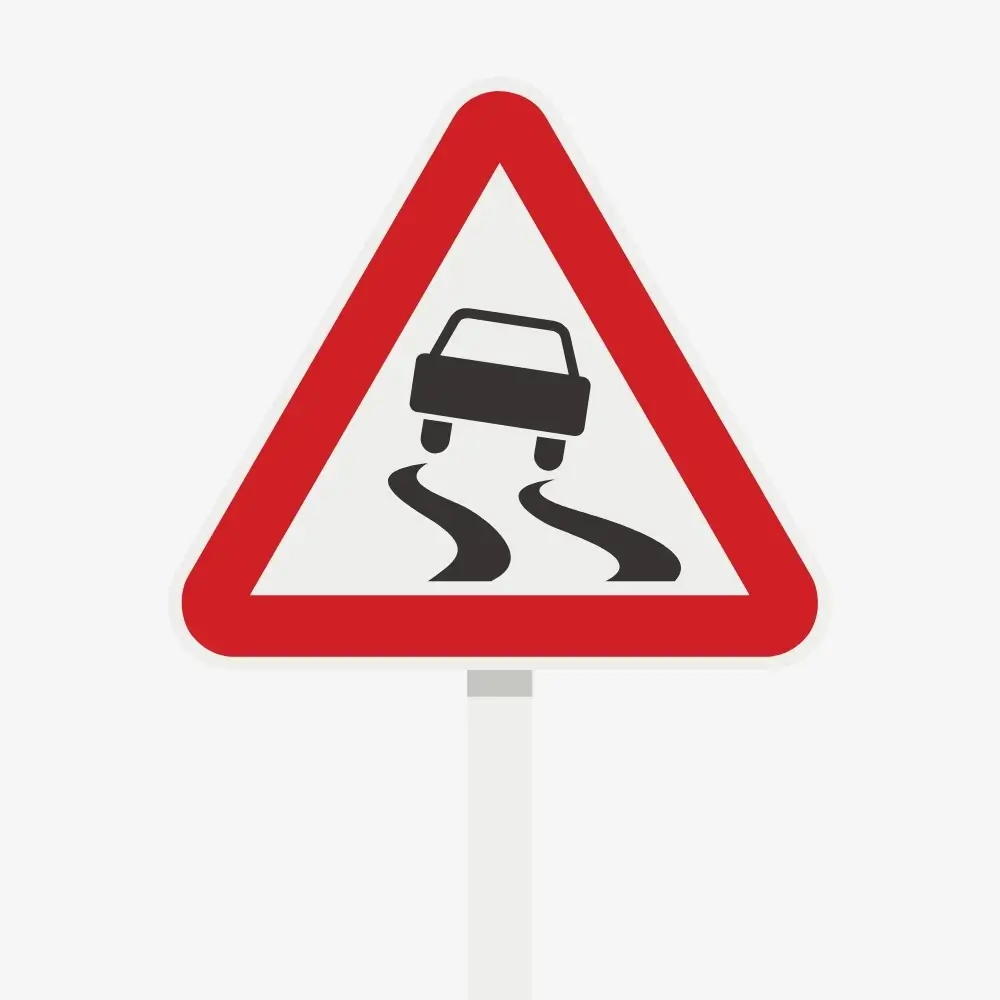 Slippery When Wet Road Sign